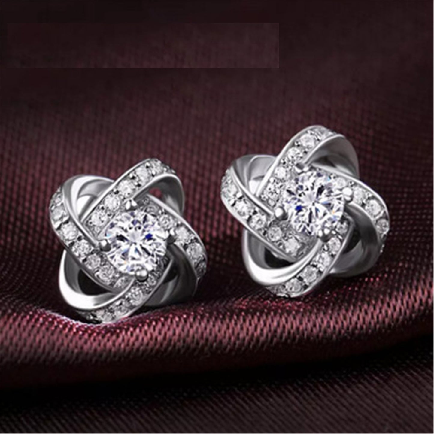Crystal Knot Stud Earrings – Sterling Silver Elegance