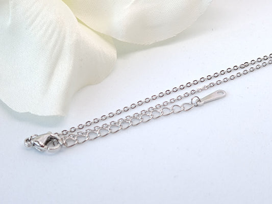 Crystal Knot Stud Necklace – Sterling Silver Elegance